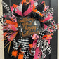 2-piece 20"H x 8.25L Plush Harlequin Witch & Legs Decor Kit